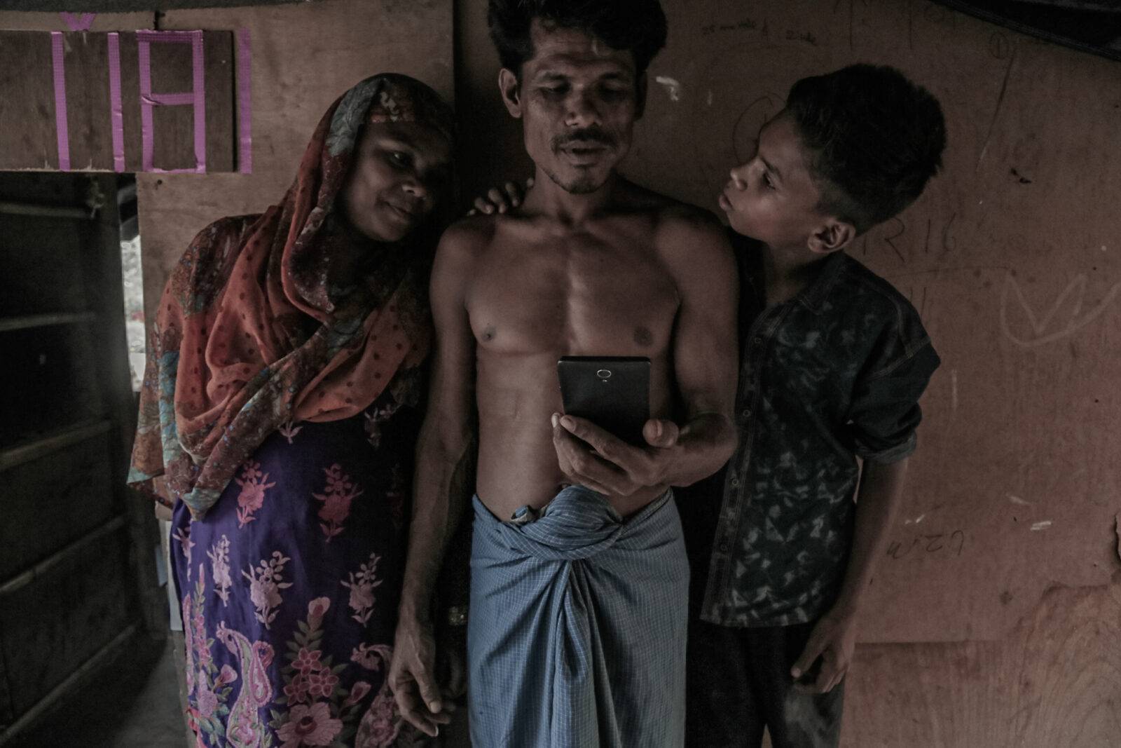 A Rohingya couple with their young son. Their daughter lives in Cox Bazaar, Bangladesh where she got married after she managed to leave Myanmar in 2012. 