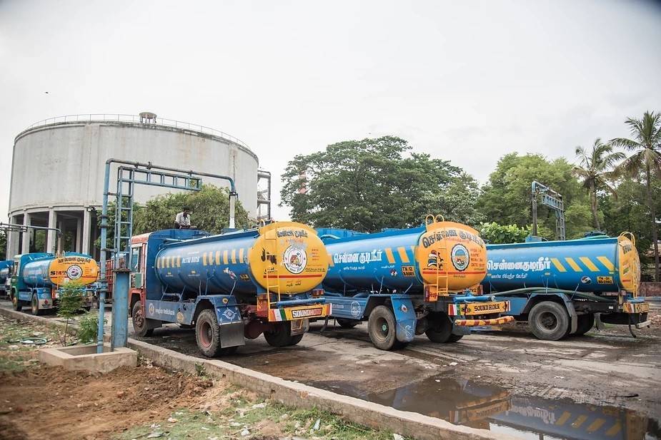 A line-up of water tankers in Valluvar Kottam Metro water pumping station, Chennai: Water tankers are mainly used to supply water to apartments, large offices and other bigger buildings for a price. Smaller tanks are used to supply water directly to people. Photo by: Steevez Rodriguez/PEP Collective.