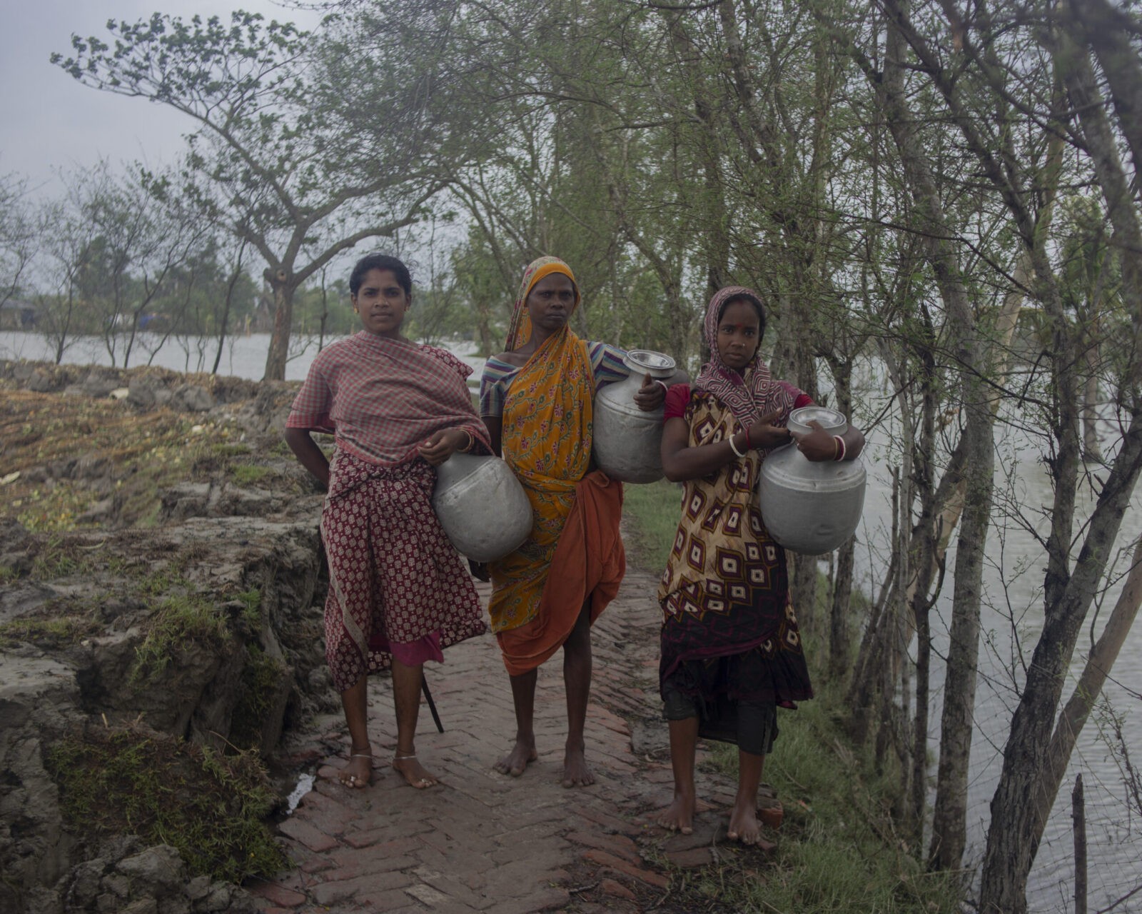 After every cyclone, the inhabitants of the Bengal delta face a major crisis of clean drinking water due to the saltwater influx. Many women travel almost two-three kilometres to fetch clean drinking water for their family, just to save them from water-borne diseases during the flood and monsoon